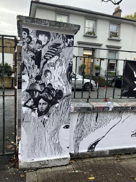 The Beatles Revolver Album Cover on the Wall of Abbey Road Studios